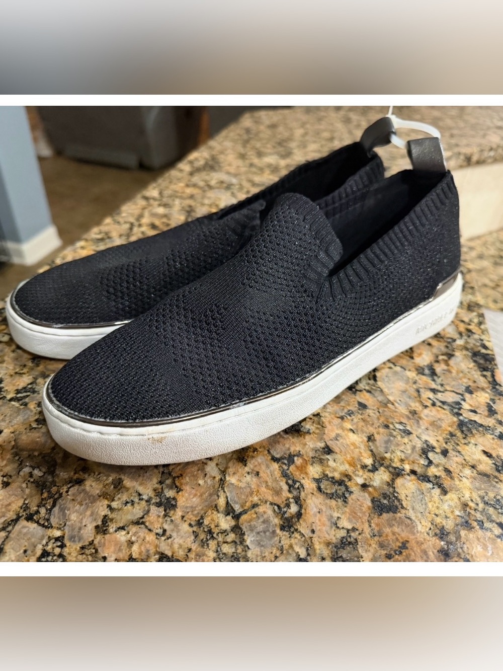 Michael Kors Black Knit Slip-On Sneakers with White Sole and Silver Heel Tab